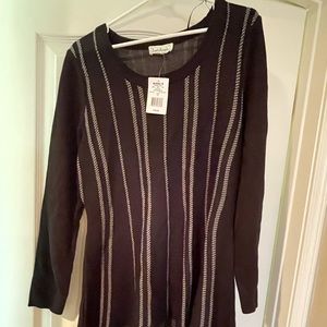 Brand new beautiful black dress. 100% acrylic 1X don’t miss out